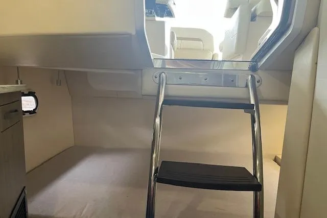 Slide: The Image of Interior cabin view of a 2020 Regal 26 XO boat with ladder access. - 6