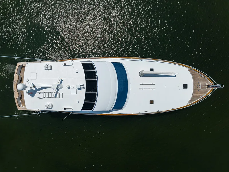 Slide: The Image of Top view of 2004 Sea Force IX 82 Enclosed Bridge yacht on water. - 13
