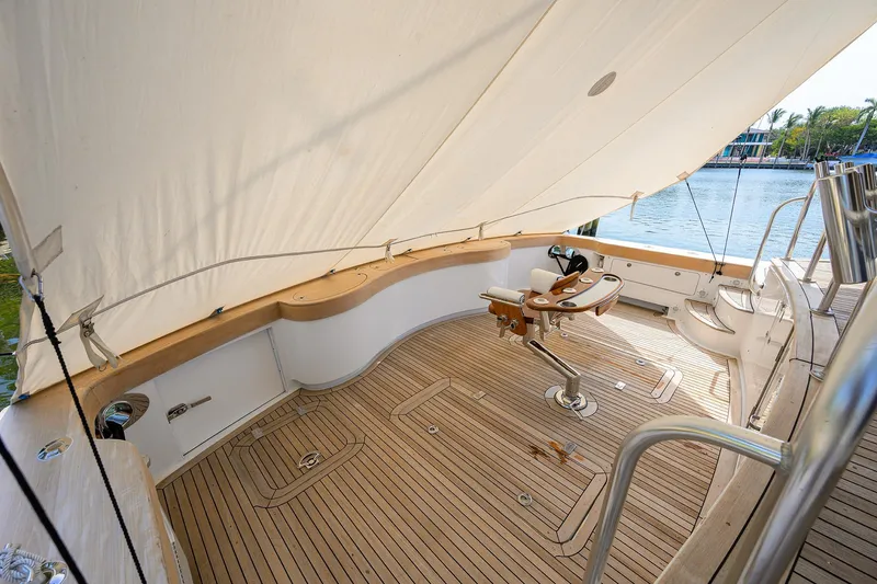 Slide: The Image of Luxurious 2004 Sea Force IX 82 Enclosed Bridge yacht deck with fishing chair. - 15