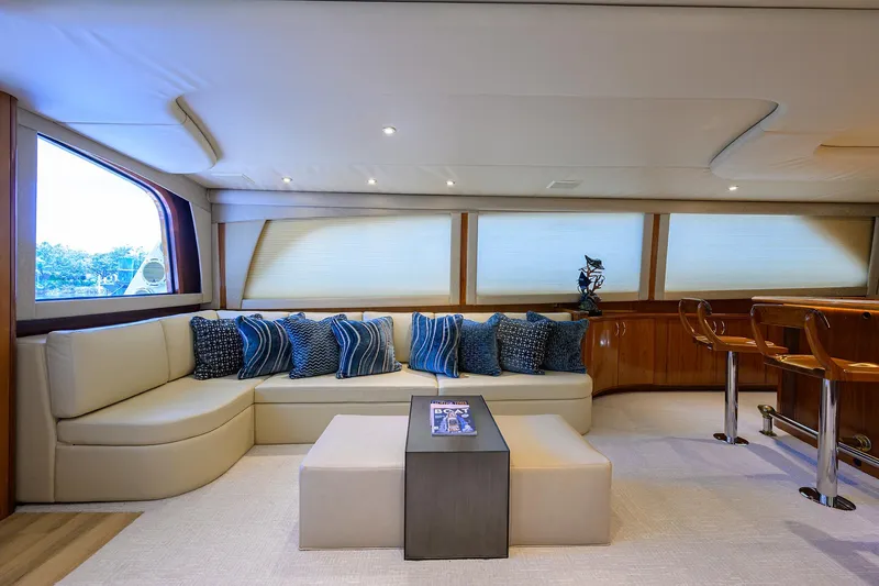 Slide: The Image of Luxurious interior of 2004 Sea Force IX 82 Enclosed Bridge yacht with plush seating and elegant decor. - 20