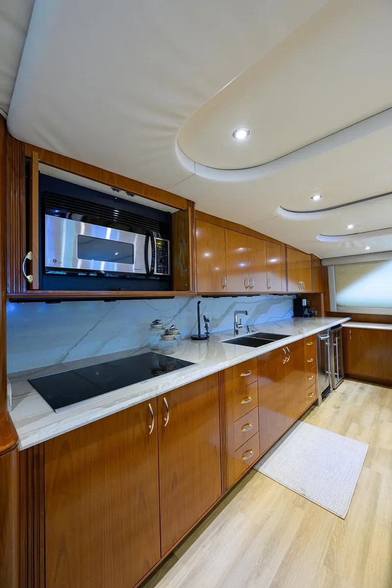 Slide: The Image of Luxurious kitchen interior of 2004 Sea Force IX 82 Enclosed Bridge yacht. - 27