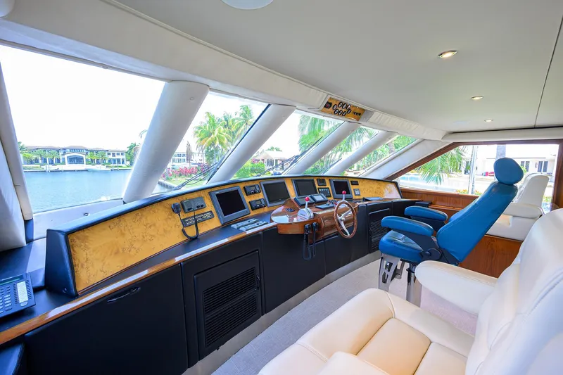 Slide: The Image of Luxurious helm of 2004 Sea Force IX 82 Enclosed Bridge yacht with panoramic windows. - 3