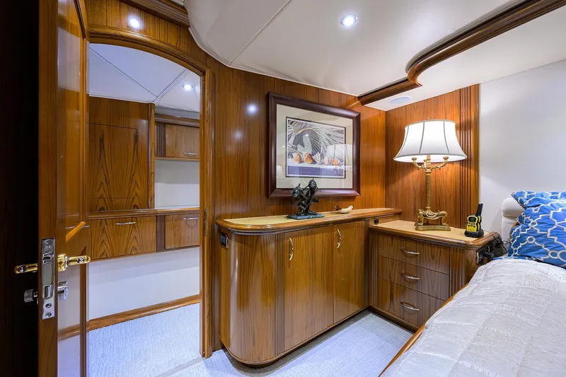 Slide: The Image of Luxurious wooden interior of 2004 Sea Force IX 82 Enclosed Bridge yacht cabin. - 34