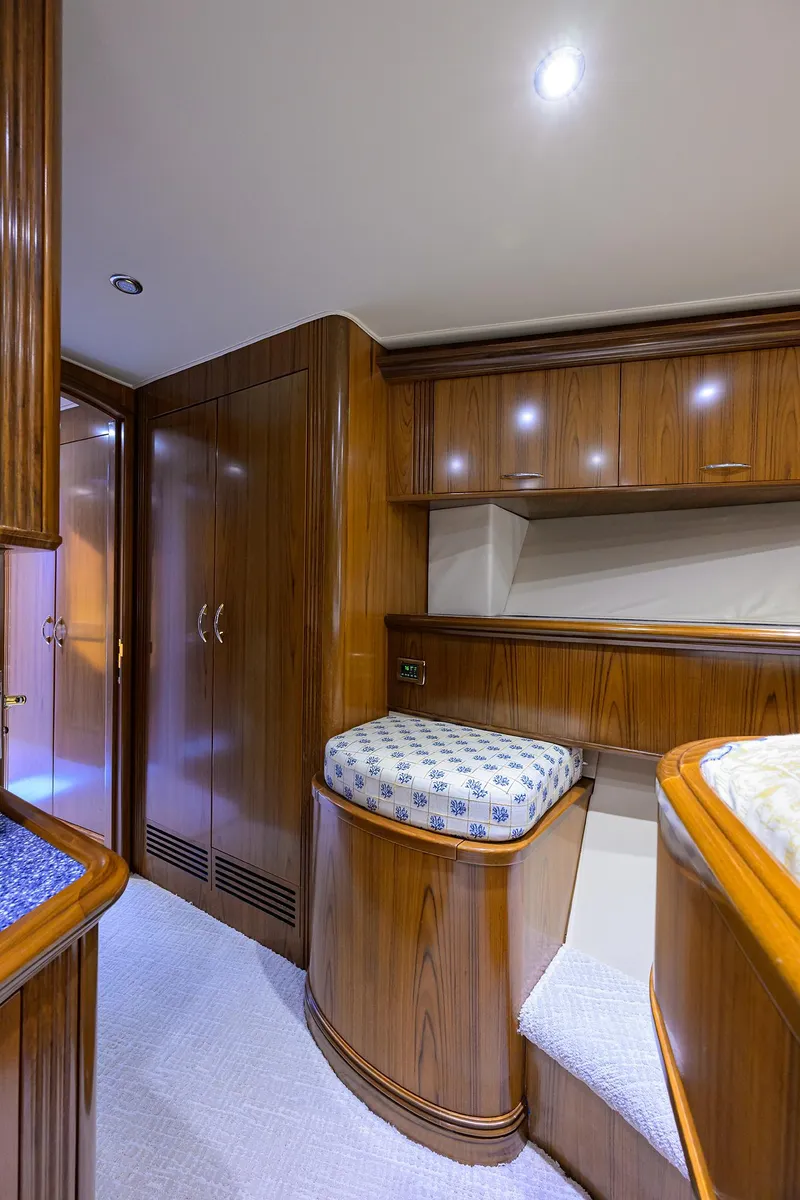 Slide: The Image of Luxurious 2004 Sea Force IX 82 Enclosed Bridge yacht interior with elegant wood finish. - 41