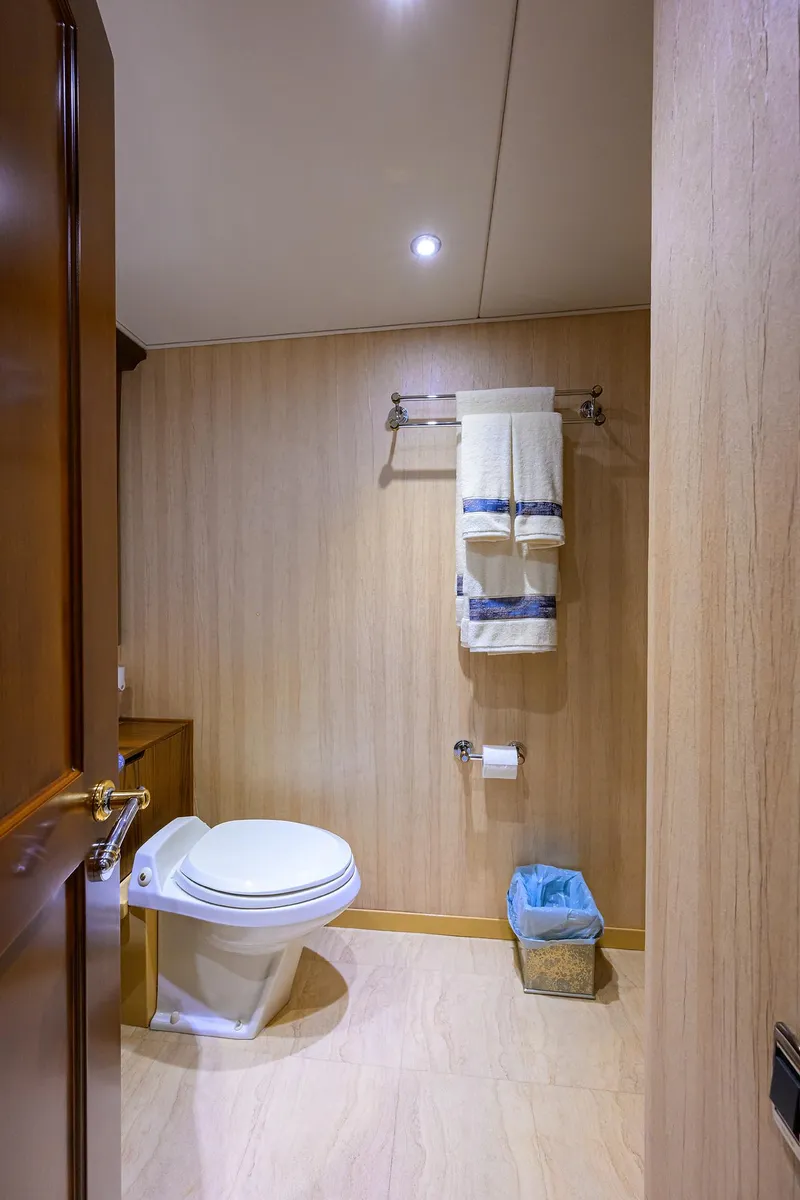 Slide: The Image of Luxurious bathroom in 2004 Sea Force IX 82 Enclosed Bridge yacht, featuring modern amenities. - 44