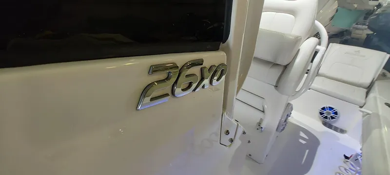 Slide: The Image of 2023 Regulator 26XO boat interior with model emblem and seating. - 32