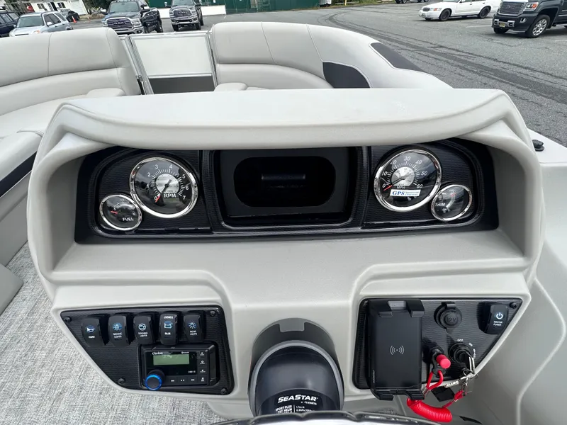 Slide: The Image of Dashboard of 2025 Berkshire 22RFX LE 2.75 pontoon boat with gauges and controls. - 13