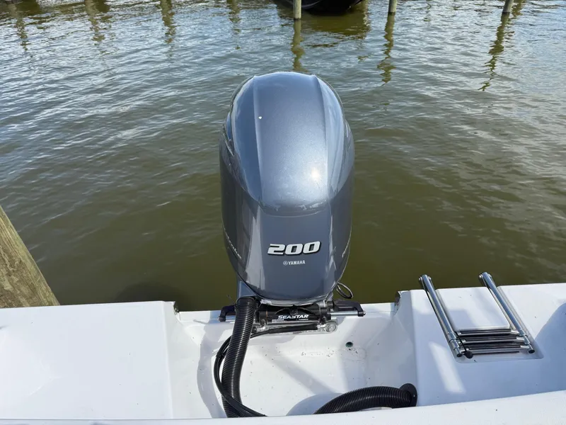 Slide: The Image of 2023 Sportsman Open 232 Center Console with Yamaha 200 outboard engine. - 4