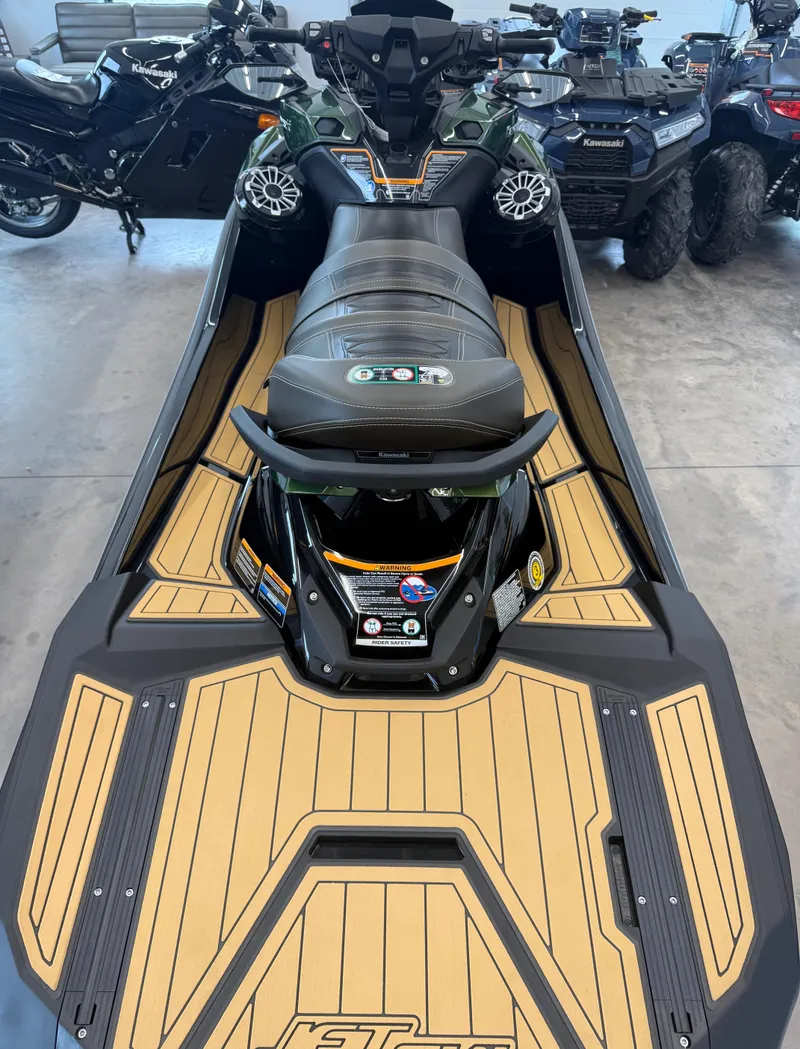 Slide: The Image of 2025 Kawasaki Jetski Ultra 310LX with sleek design and advanced features in showroom. - 5