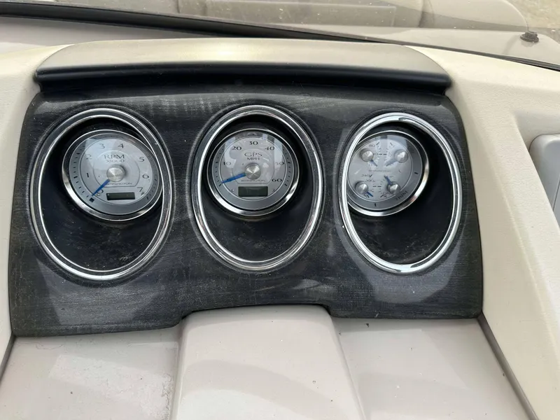 Slide: The Image of Dashboard gauges of a 2016 Bennington 2875 QCW I/O boat. - 5