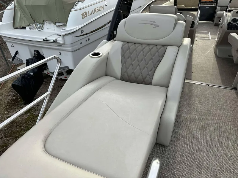 Slide: The Image of 2016 Bennington 2875 QCW I/O boat with luxurious seating and elegant design. - 7