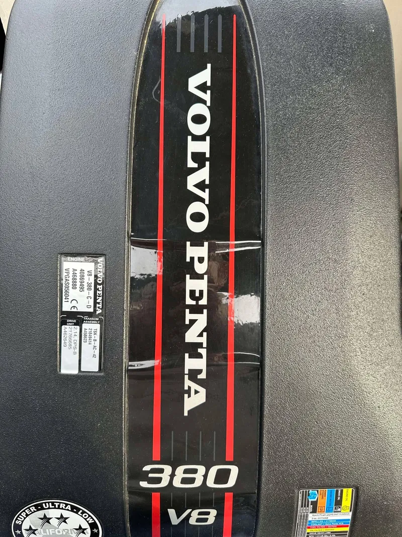 Slide: The Image of Volvo Penta 380 V8 engine cover on 2016 Bennington 2875 QCW I/O boat. - 8