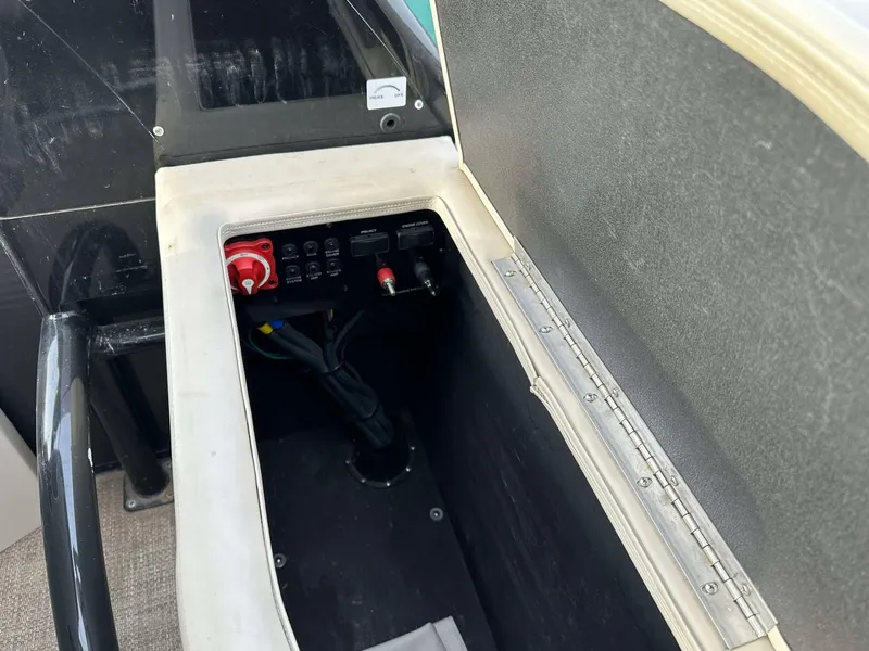 Slide: The Image of 2016 Bennington 2875 QCW I/O boat compartment with control panel and wiring. - 9