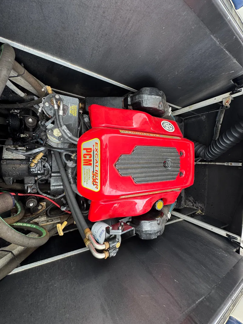 Slide: The Image of 2007 Nautique Super Air Nautique 230 engine with red PCM cover. - 22