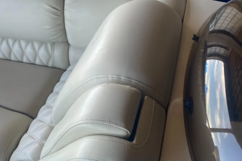 Slide: The Image of Luxurious seating on a 2012 Bennington R22 boat with elegant upholstery. - 10