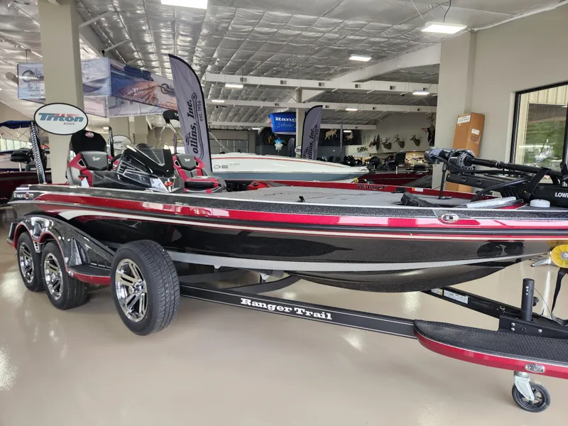 Slide: The Image of 2025 Ranger Z520R Cup-Equipped boat displayed indoors on a trailer. - 1