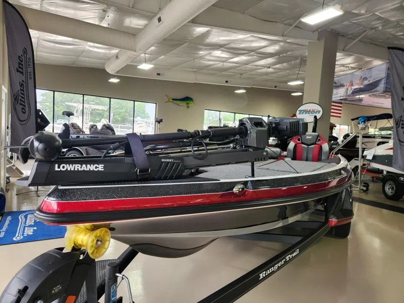 Slide: The Image of 2025 Ranger Z520R Cup-Equipped boat displayed indoors with advanced fishing equipment. - 14