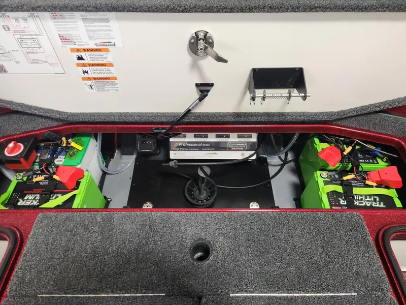 Slide: The Image of 2025 Ranger Z520R Cup-Equipped boat battery compartment with wiring and power management system. - 22