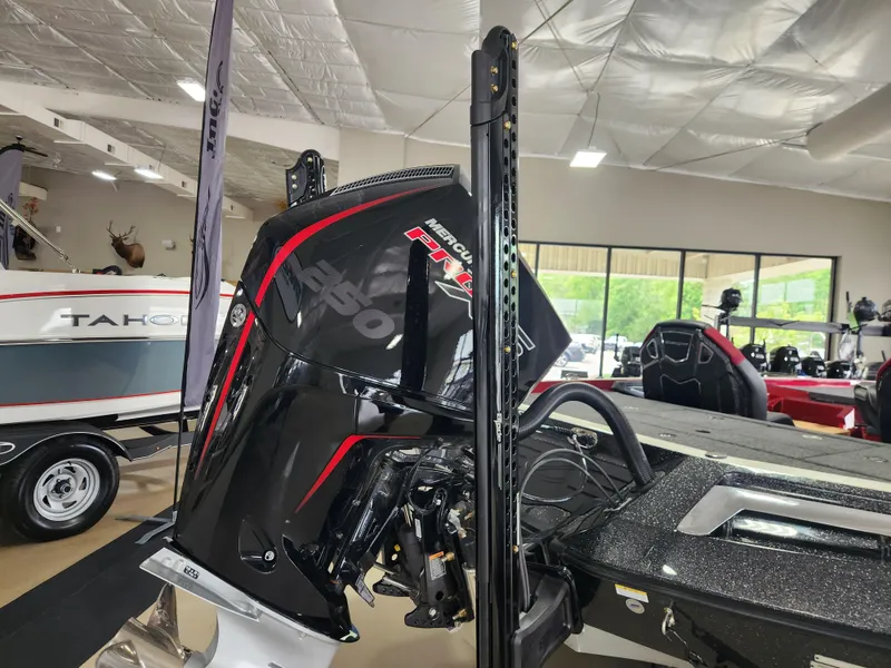 Slide: The Image of 2025 Ranger Z520R Cup-Equipped boat with powerful outboard motor in showroom. - 3