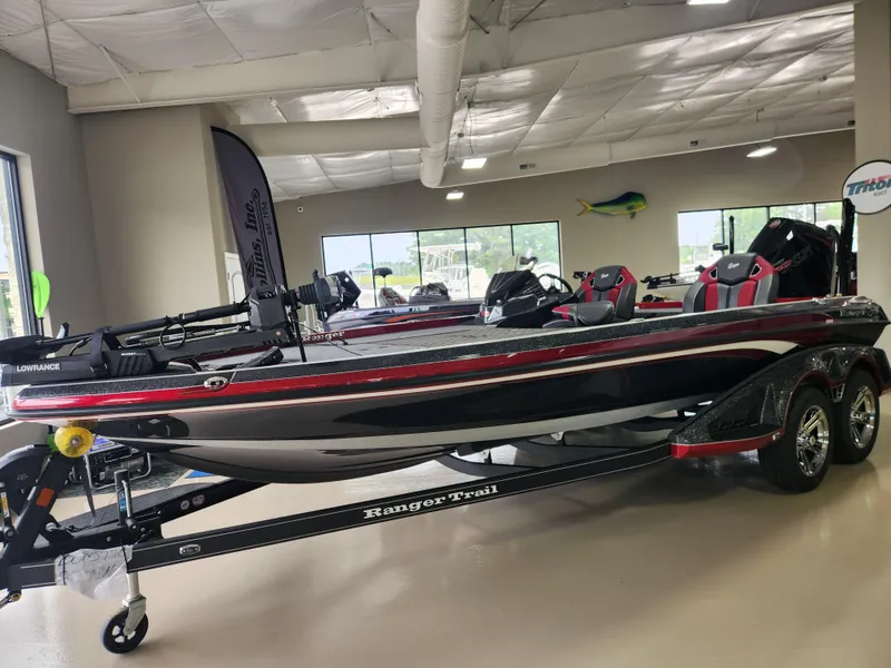 Slide: The Image of 2025 Ranger Z520R Cup-Equipped boat displayed indoors on a trailer. - 6