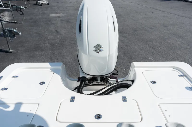 Slide: The Image of 2023 Sea Pro 208 Bay boat with Suzuki outboard motor, rear deck view. - 10