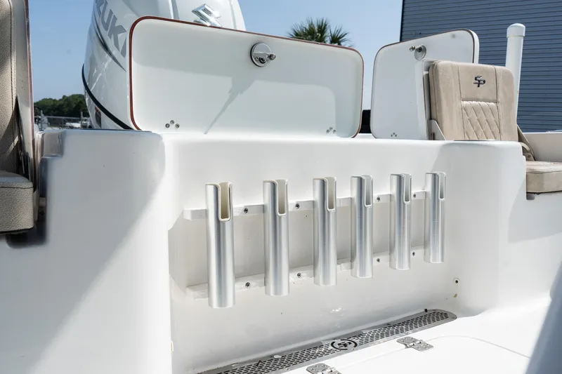 Slide: The Image of 2023 Sea Pro 208 Bay boat with rod holders and seating area. - 12