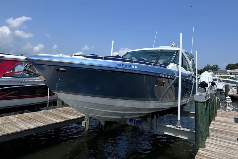 The Image of 2020 Formula 430 Super Sport Crossover boat docked at marina. - 0