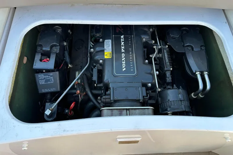 Slide: The Image of Engine compartment of a 1997 Four Winns 240 Horizon with Volvo Penta engine. - 15
