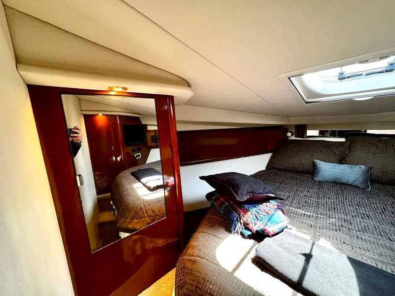 Slide: The Image of Luxurious cabin interior of 2010 Sea Ray 40 Sundancer yacht with cozy bedding. - 37