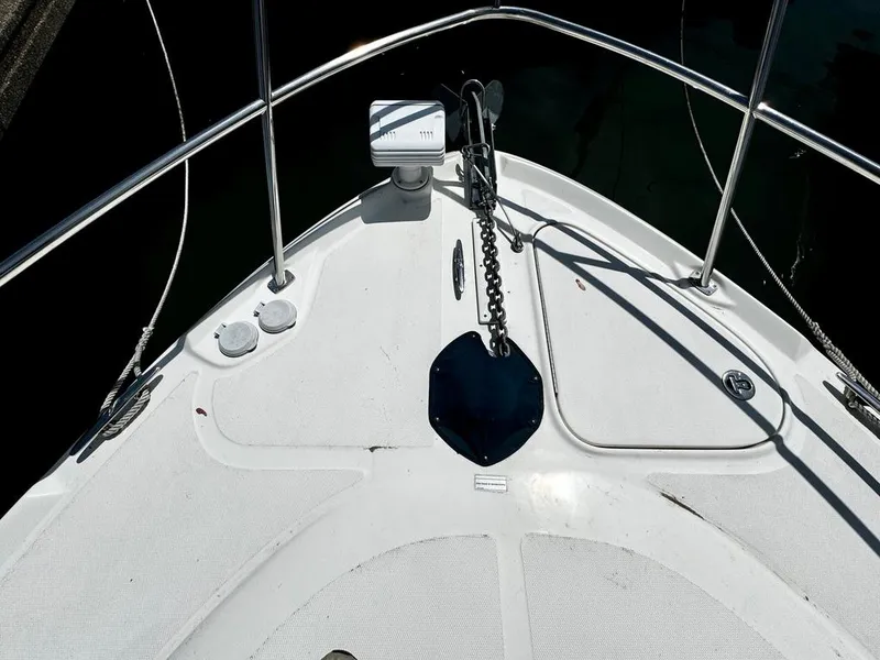 Slide: The Image of Bow of 2010 Sea Ray 40 Sundancer with anchor and railing. - 6