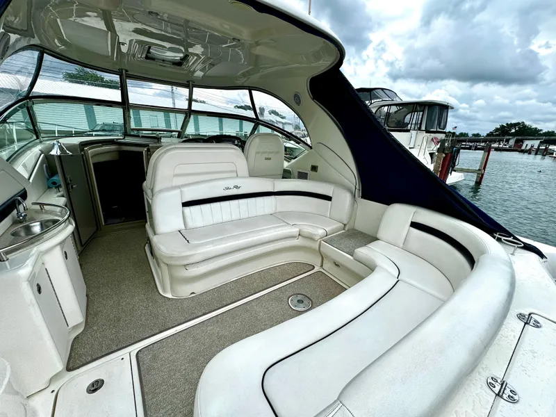 Slide: The Image of 2010 Sea Ray 40 Sundancer yacht interior with spacious seating and elegant design. - 9