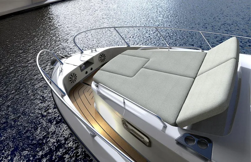 Slide: The Image of Luxurious 2025 Oryx 32 LX yacht with spacious sunbathing deck on calm water. - 6