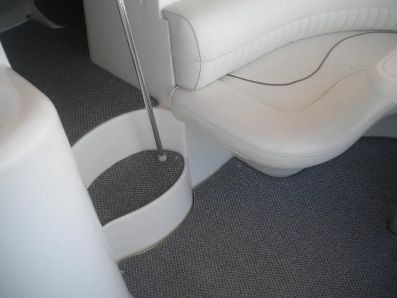 Slide: The Image of 1998 Cruisers 3870 Express interior with white seating and carpeted flooring. - 18