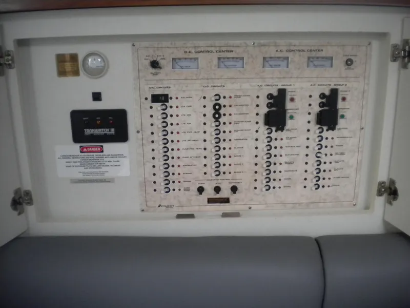 Slide: The Image of Electrical control panel on a 1998 Cruisers 3870 Express boat. - 32