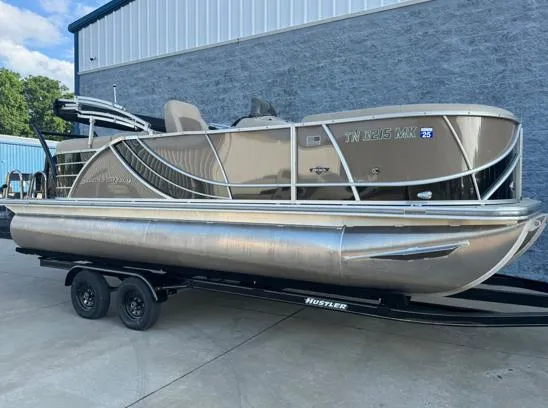 Slide: The Image of 2019 South Bay 521RS 3.0 pontoon boat on trailer, parked outside a building. - 10