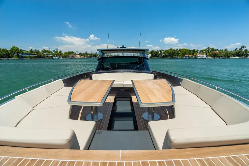 Slide: The Image of Luxurious 2019 CNM Continental 54T yacht with spacious deck and seating area. - 18