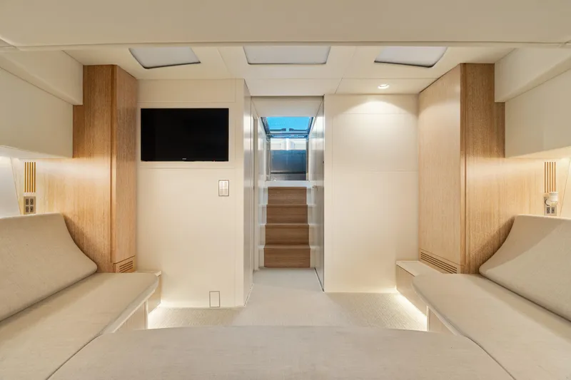 Slide: The Image of Luxurious interior of 2019 CNM Continental 54T yacht with modern design and cozy seating. - 22