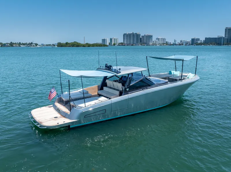 Slide: The Image of 2019 CNM Continental 54T yacht on calm water with city skyline background. - 5