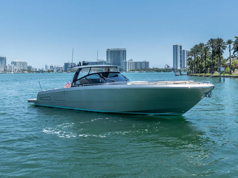 Slide: The Image of 2019 CNM Continental 54T yacht on water with city skyline background. - 8