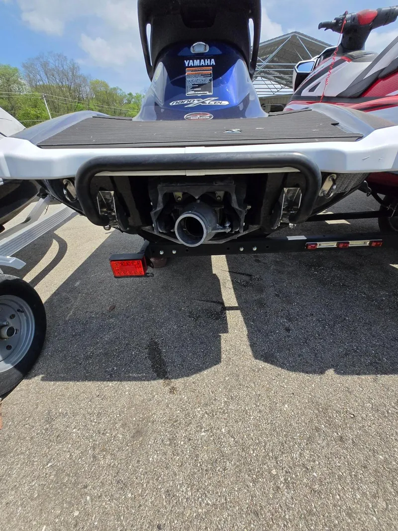 Slide: The Image of 2018 Yamaha Boats VX110 jet ski rear view on trailer. - 8