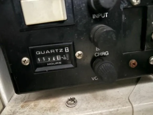 Slide: The Image of Control panel of a 2005 Rinker Fiesta Vee 342 boat showing 1174.8 hours on quartz meter. - 35