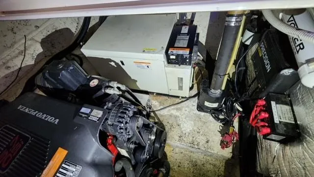 Slide: The Image of Engine compartment of 2005 Rinker Fiesta Vee 342 with Volvo Penta engine and electrical components. - 36