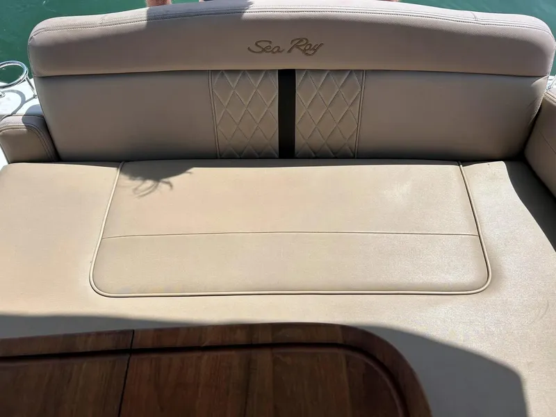 Slide: The Image of Luxurious seating on a 2017 Sea Ray 280 Sundancer boat, featuring elegant upholstery. - 30