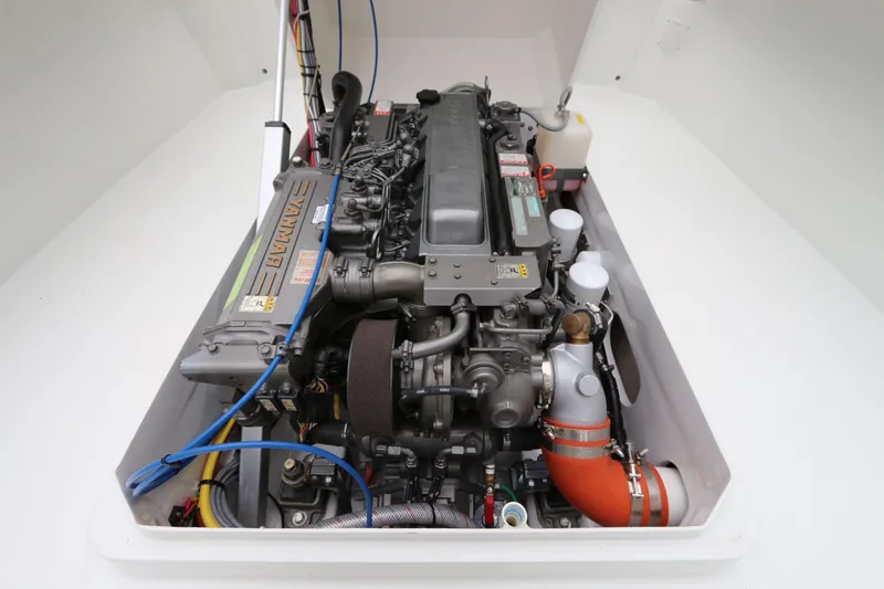 Slide: The Image of Engine of 2018 Blackfin Custom 25 boat, showcasing detailed components and wiring. - 10