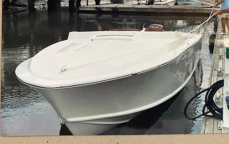 Slide: The Image of 2018 Blackfin Custom 25 boat docked in calm waters. - 14