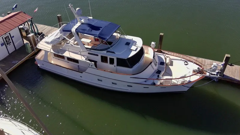 Slide: The Image of Aerial view of a 1990 Fleming 50 yacht docked at a marina. - 0