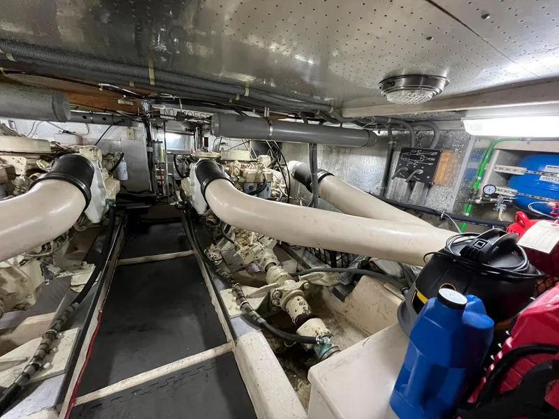 Slide: The Image of Engine room of a 1990 Fleming 50 yacht, showcasing machinery and equipment. - 39