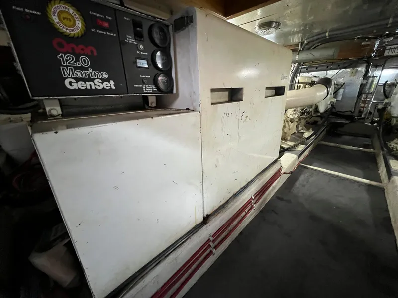 Slide: The Image of Onan 12.0 Marine GenSet in 1990 Fleming 50 engine room. - 40