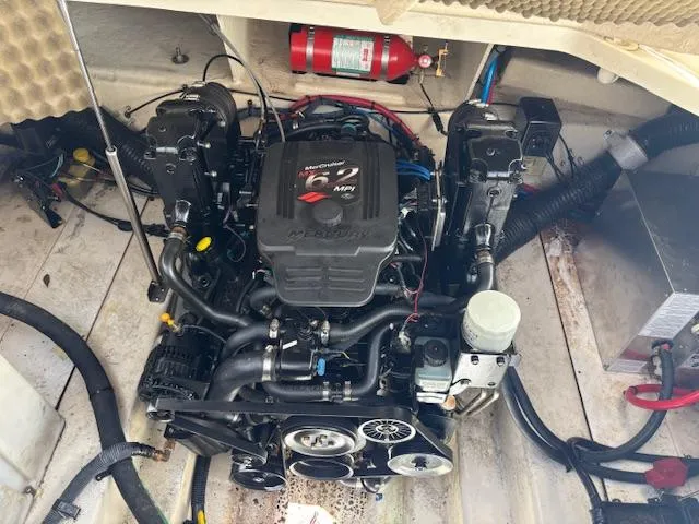 Slide: The Image of Engine compartment of a 2007 Sea Ray 270 Amberjack boat, featuring a MerCruiser engine. - 8