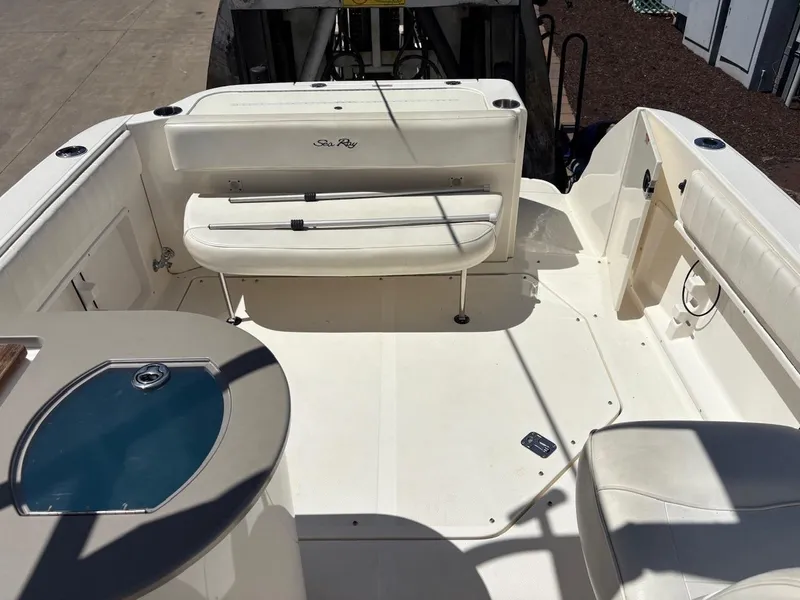 Slide: The Image of 2007 Sea Ray 270 Amberjack boat interior with seating and storage compartments. - 9